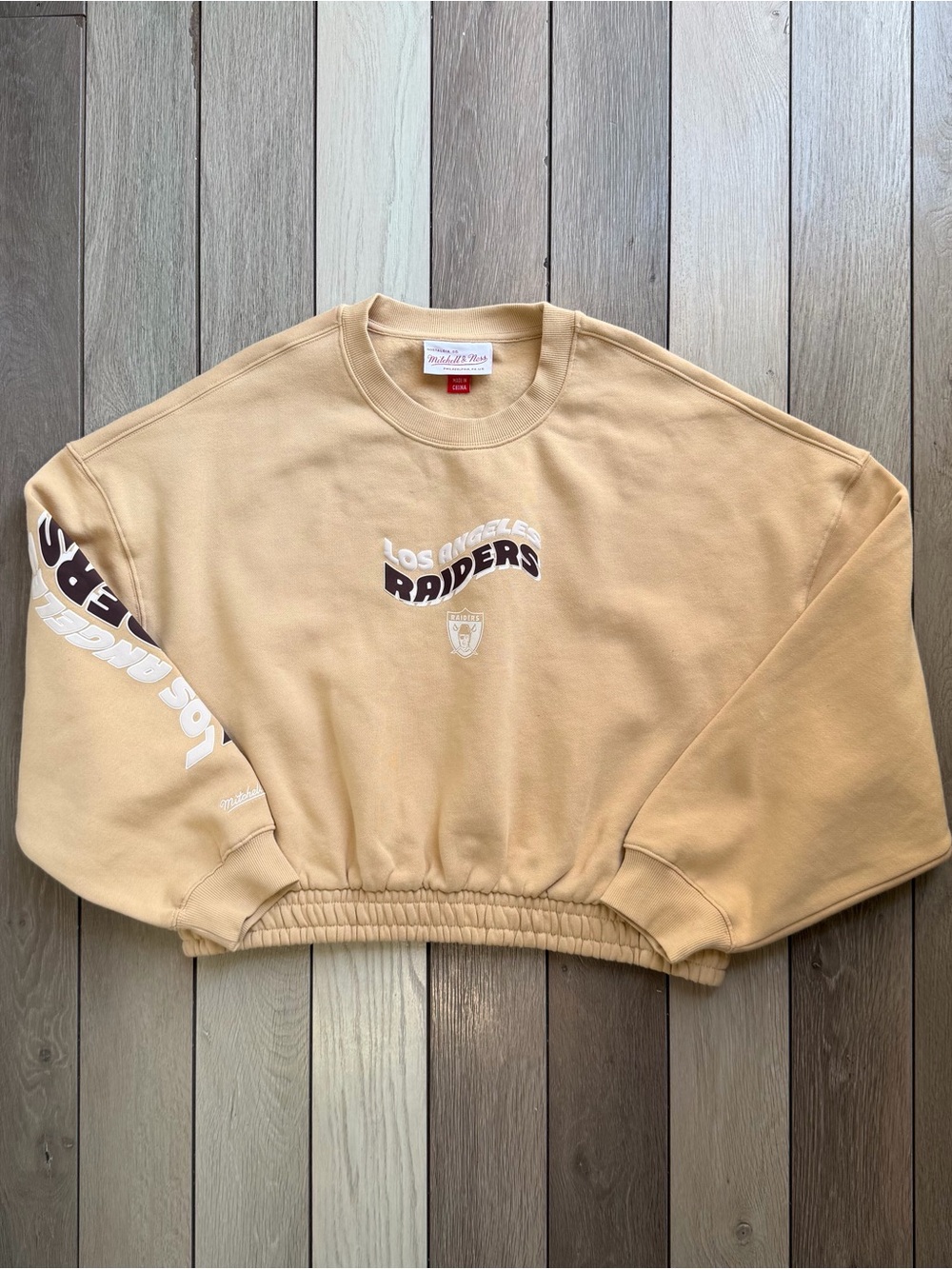Mitchell & Ness βLos Angeles Raidersβ Tan Crewneck Sweatshirt